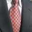 chess tie with gold chess pieces